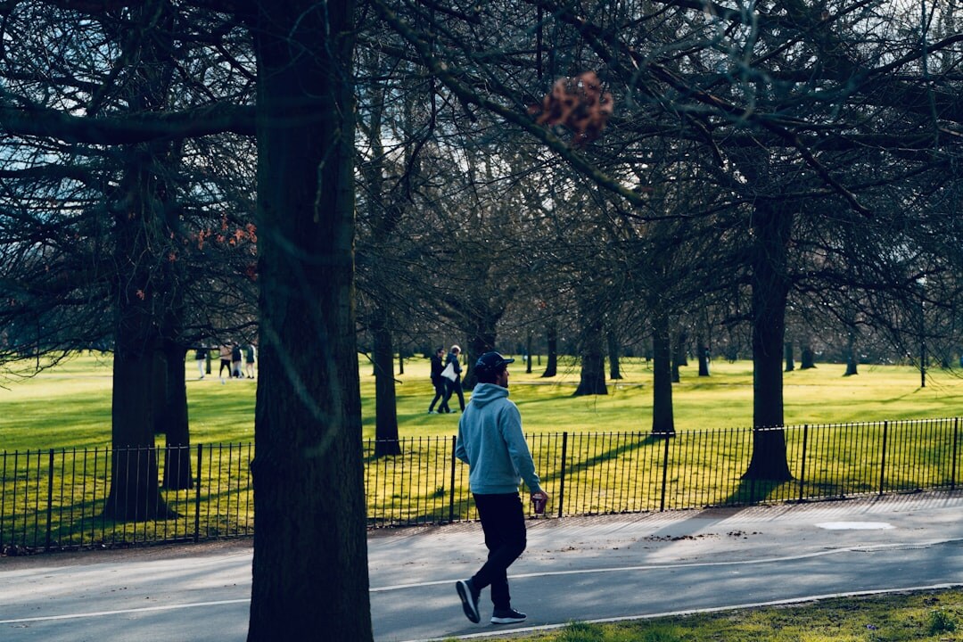 actor walking in park