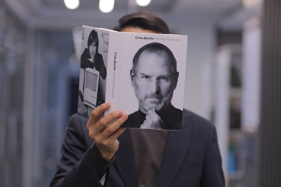music legend holding book