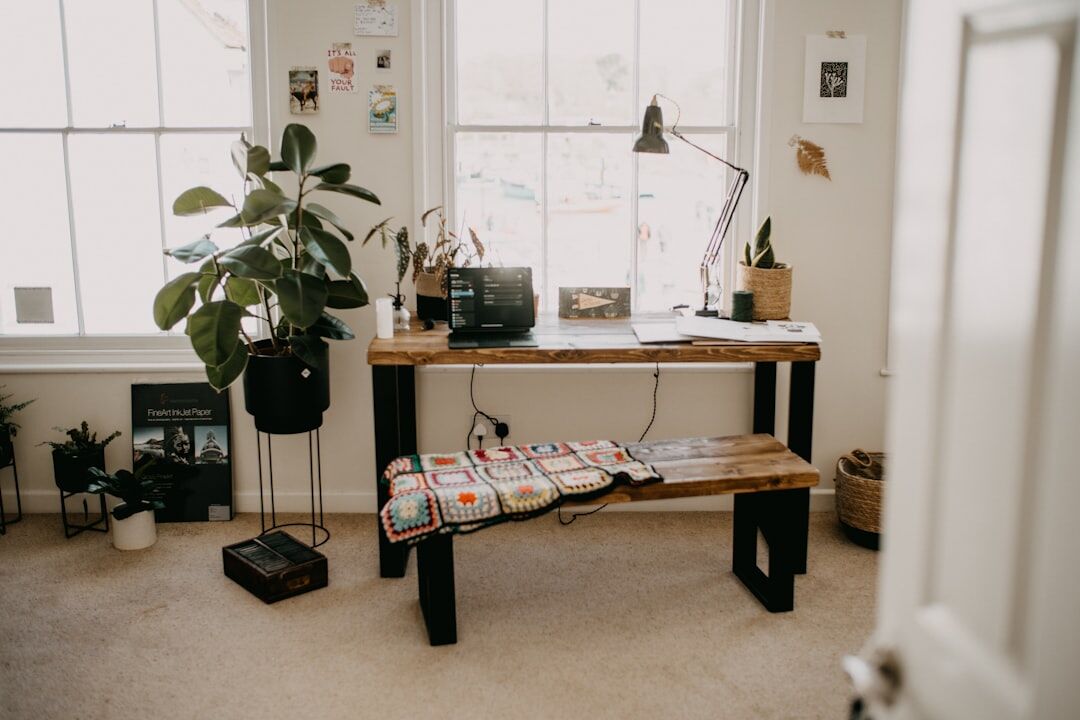Desk with telephone and notebook in an office