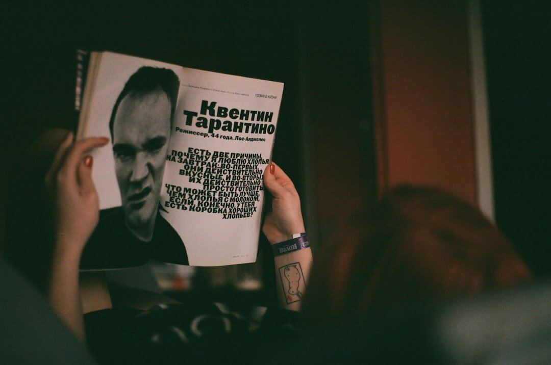 music legend holding book